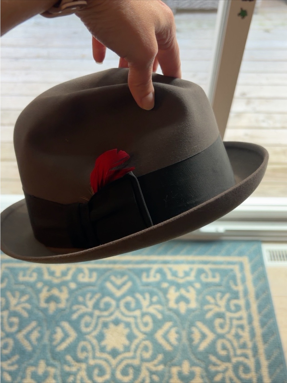Stylish Gray Felt Fedora with Black Band and Red Feather Accent